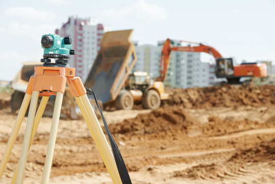 surveyor equipment level at construction site