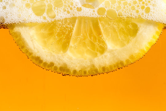 Lemon in the beer bubbles
