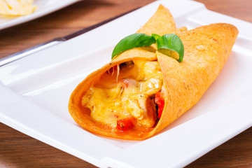 Mexican enchiladas on the plate