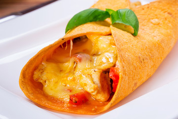 Mexican enchiladas on the plate