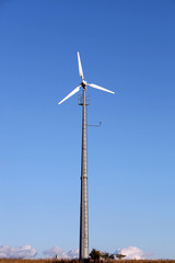 Small wind turbine generating electricity for the household