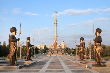 Monumen Arch of Independence in sunset. Ashkhabad. Turkmenistan. - obrazy, fototapety, plakaty