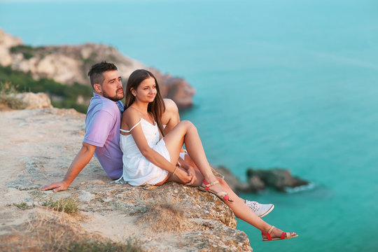 Young Happy Interracial Couple On Beach Smiling