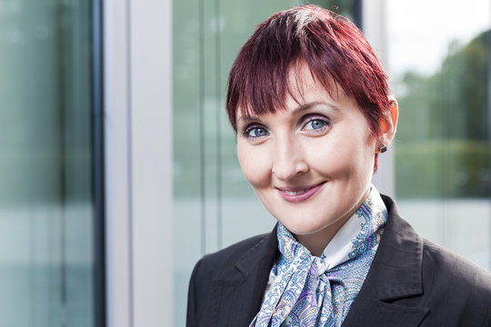 office outdoor portraits of a young well educated business women