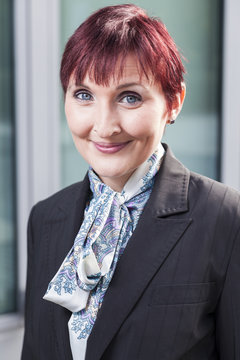 office outdoor portraits of a young well educated business women