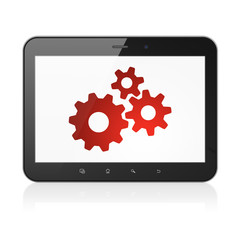 Web design concept: Gears on tablet pc computer