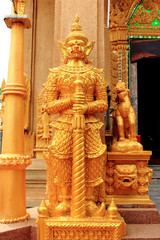 Golden giant  statues in temple