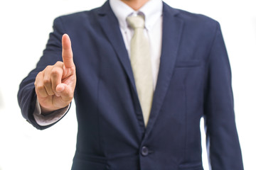 portrait of young business man pointing up