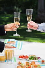 Success celebration in garden