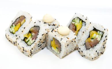 Japanese rolls in a restaurant with fish and vegetables