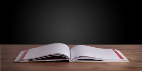 Open book on wooden deck