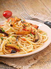 spaghetti with fried eggplant and tomatoes and sweet 