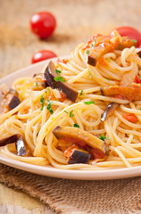 spaghetti with fried eggplant and tomatoes and sweet 