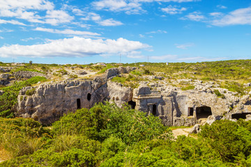 Cala Morell Necropolis Caves at Menorca, Spain. - obrazy, fototapety, plakaty