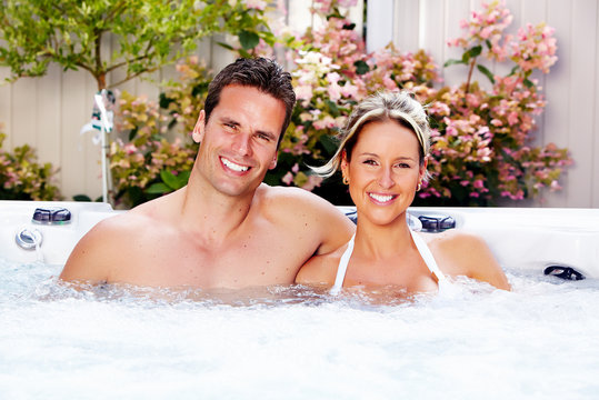 Happy couple in hot tub
