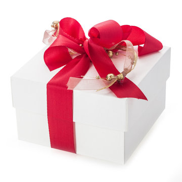 White gift box with red and gold bows