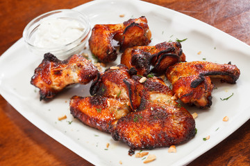 Chicken wings with sauce