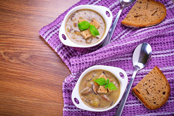 Mushroom soup with potato and croutons
