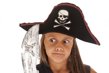 Young pirate girl with pirates hat and sword, pulling funny face