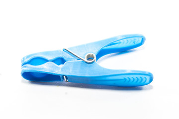 colored clothespins on a white background