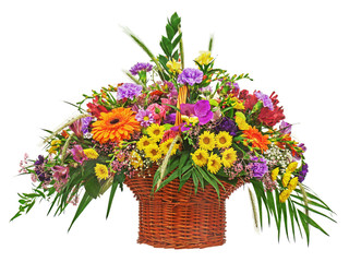 Flower bouquet arrangement centerpiece in wicker basket isolated