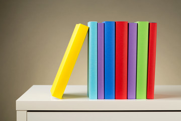 Books on a White Desk
