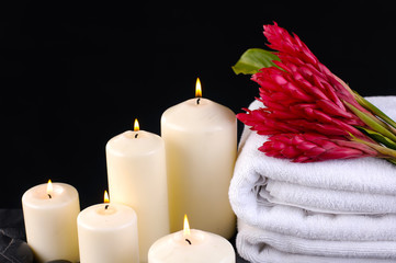 Obraz na płótnie Canvas Spa feeling with candle, Ginger flower, towel ,