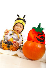 Amazed baby in bee hat
