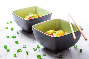 Two bowls of noodle soup with shrimp