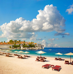 Beach near the island Sveti Stefan. Montenegro - obrazy, fototapety, plakaty