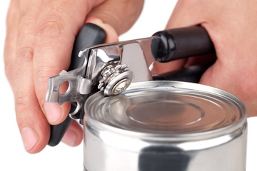 Tin opener opening a can