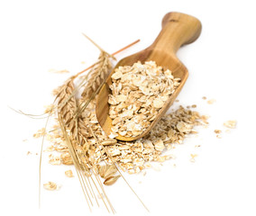 oatmeal with wheat spikelets in a scoop