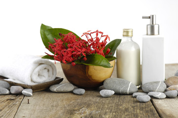 Spa set with red tropical flower ,stones, towel