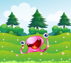 A pink monster near the pine trees