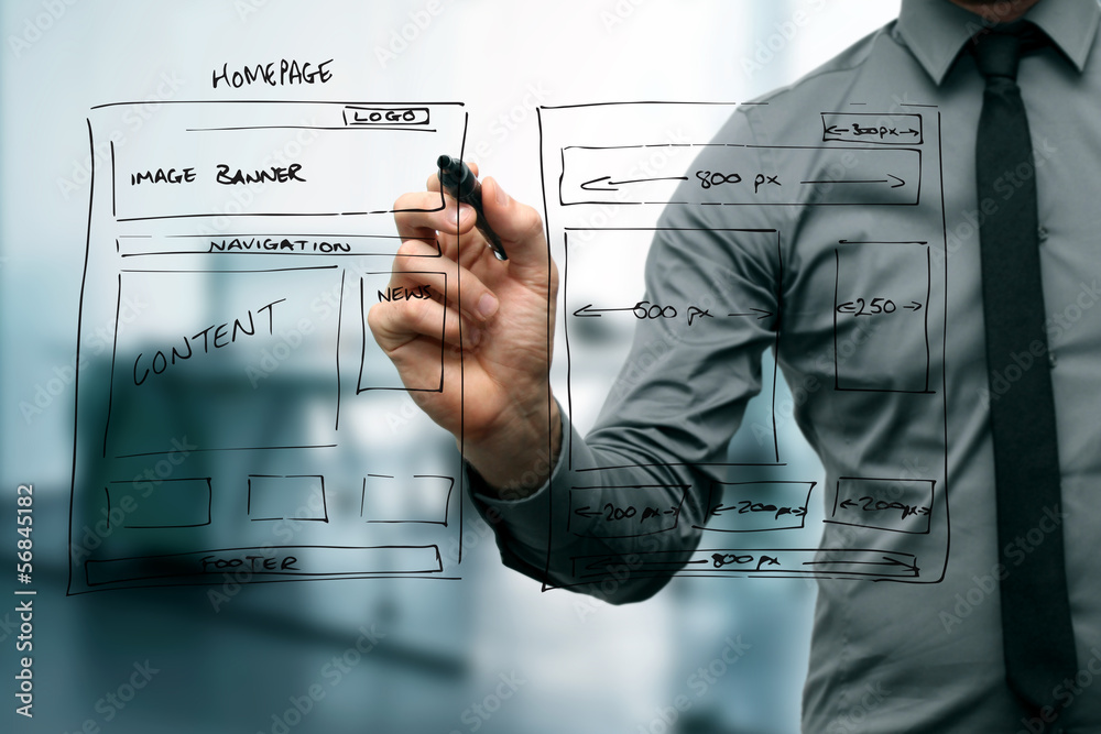 Poster designer drawing website development wireframe