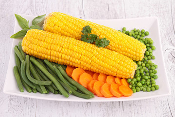 plate of corn and vegetables