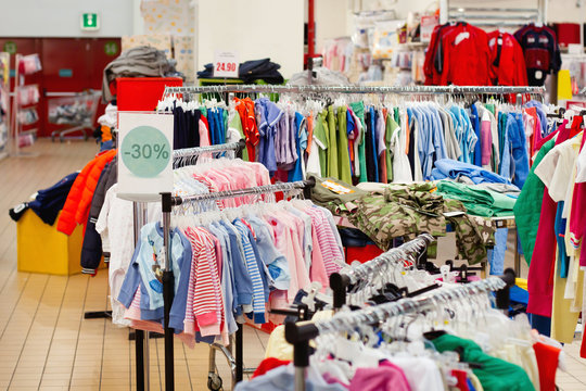 sale of children's wear in abstract supermarket