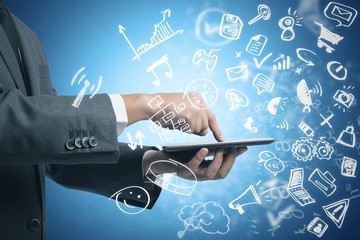 Businessman working with tablet and social media