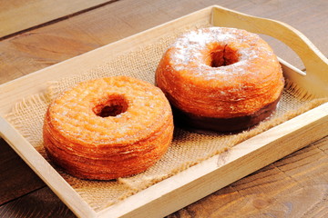 Trendy puff pastries, half croissant and half donut