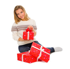 Young girl with gift boxes
