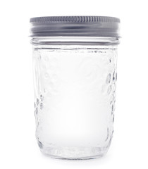 empty glass jarr isolated on a white background