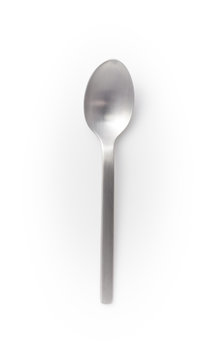 empty stainless steel spoon isolated on a white background