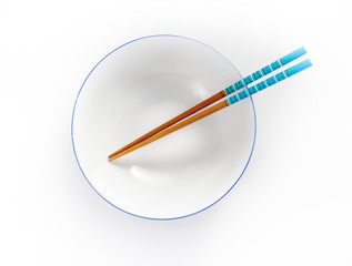 chopsticks in empty bowl isolated on a white background