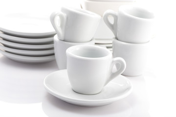 Fototapeta na wymiar espresso cups and saucers isolated on a white background