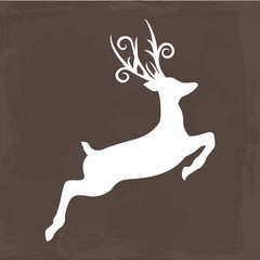 Springendes Reh auf braunem Hintergrund