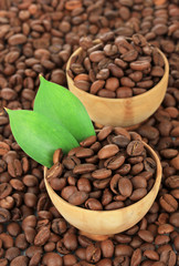 Coffee beans in bowls isolated on white