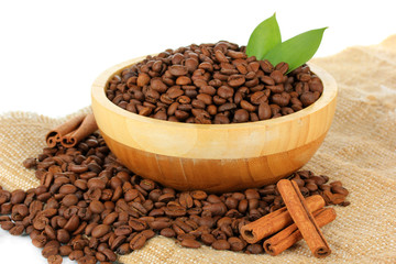 Coffee beans in bowl on white background