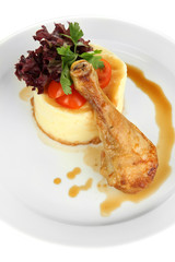 Small portion of food on big plate isolated on white