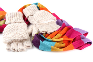 Wool fingerless gloves and multicolor scarf, isolated on white
