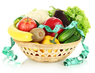 Fresh vegetables in wicker basket isolated on white